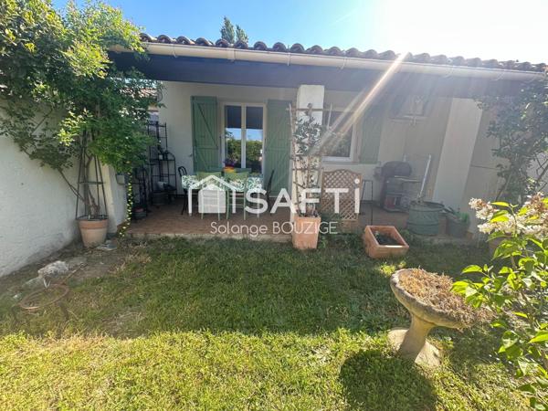 Maison de plain pied en lotissement avec jardin,garage, 2 chambres proche du centre ville