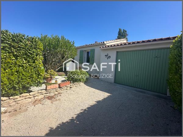 Maison de plain pied en lotissement avec jardin,garage, 2 chambres proche du centre ville