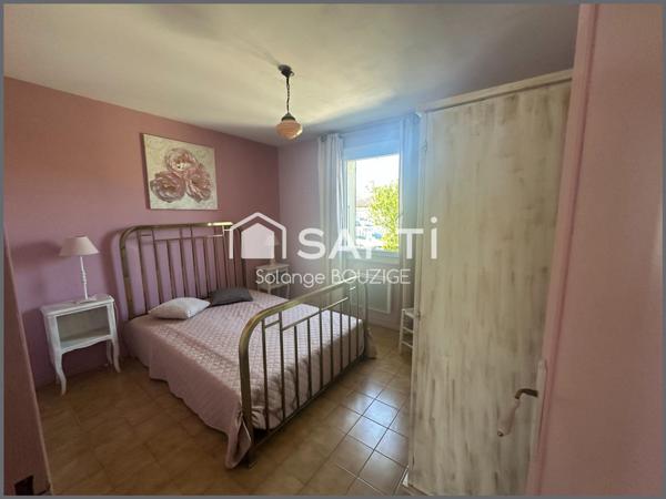 Maison de plain pied en lotissement avec jardin,garage, 2 chambres proche du centre ville