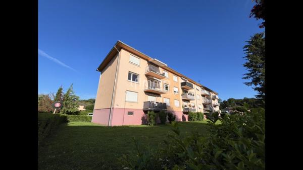 Appartement traversant 4 pièces 95m², balcon, garage et cave