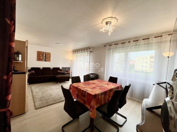 Appartement traversant 4 pièces 95m², balcon, garage et cave