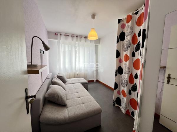 Appartement traversant 4 pièces 95m², balcon, garage et cave