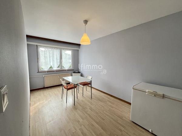 Appartement traversant 4 pièces 95m², balcon, garage et cave