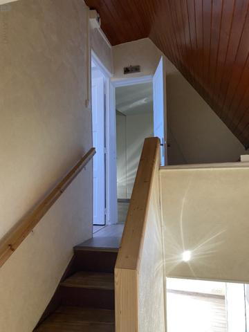 Jolie maison mitoyenne atypique