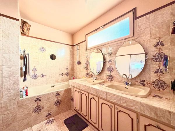 Appartement de 100m2, avec cave et box