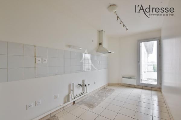 Appartement familial 4 pièces avec 2 balcons, 2 parkings et cave