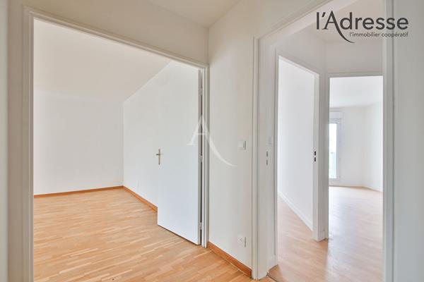 Appartement familial 4 pièces avec 2 balcons, 2 parkings et cave