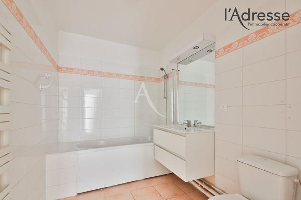 Appartement familial 4 pièces avec 2 balcons, 2 parkings et cave