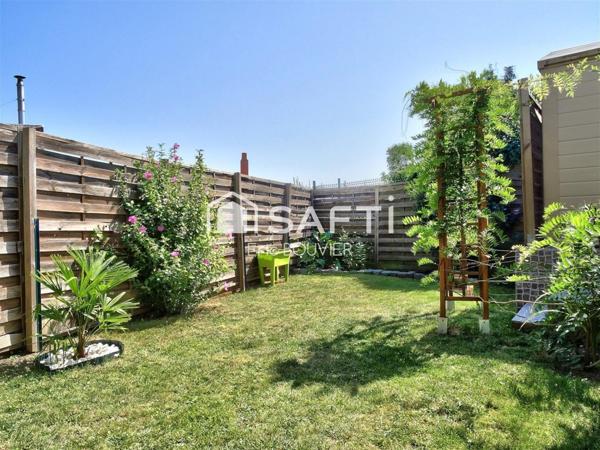 Charmante semi-individuelle avec garage et jardin et de beaux equipements!