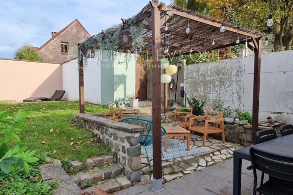 WATTRELOS – Maison familiale rénovée avec jardin, garage et confort moderne – Quartier recherché !