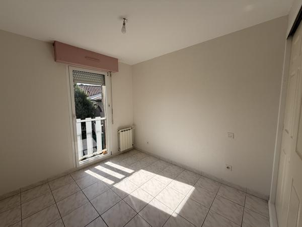 Maison mitoyenne avec terrasse et garage