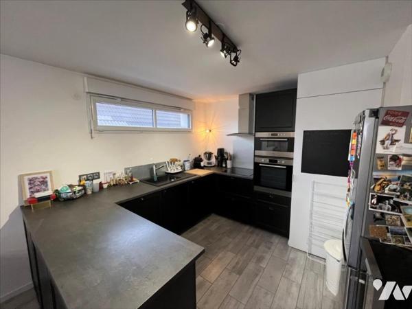 Appartement T3 avec balcon et garage