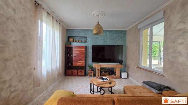 Maison de caractère T8 individuelle de 230m², DPE C, avec jardin, garage et dépendance