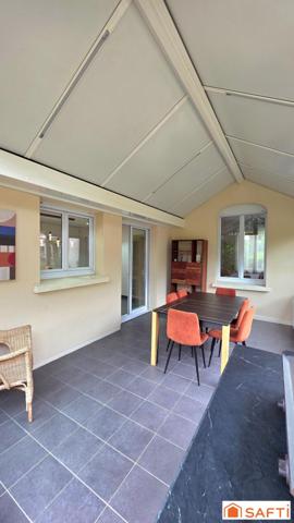 Maison de caractère T8 individuelle de 230m², DPE C, avec jardin, garage et dépendance