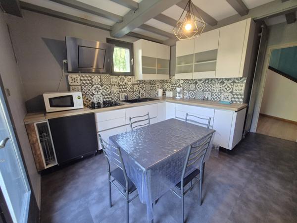 Maison mitoyenne d'un côté de 124,60 m² sur deux niveaux