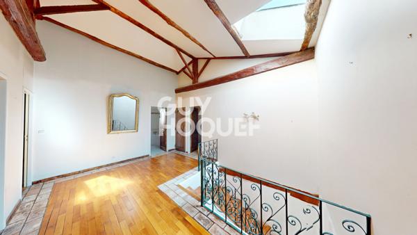 Bien d'exception en centre-ville : 175 m² habitables, jardin de 1 092 m² et garage double