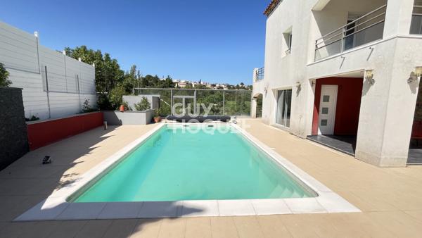 Maison Juvignac 8 pièce(s) avec piscine donnant sur le golf