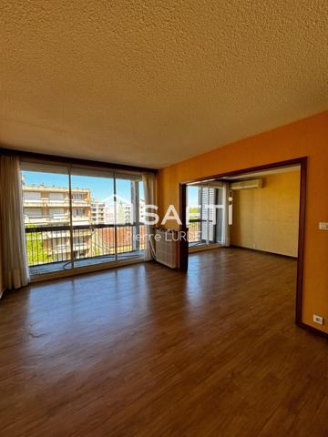 Appartement T5 rénové avec balcons et stationnement