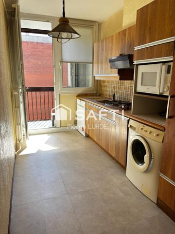 Appartement T5 rénové avec balcons et stationnement