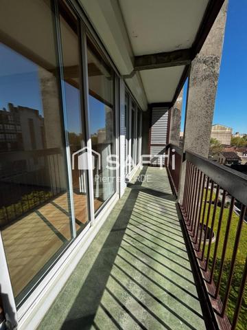 Appartement T5 rénové avec balcons et stationnement