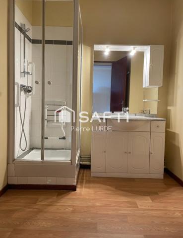Appartement T5 rénové avec balcons et stationnement