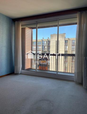 Appartement T5 rénové avec balcons et stationnement