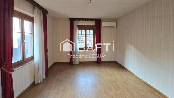 Grande maison avec  multiples possibilités d'explotation