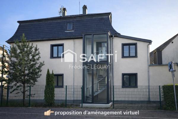 Grande maison avec  multiples possibilités d'explotation