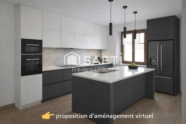 Grande maison avec  multiples possibilités d'explotation