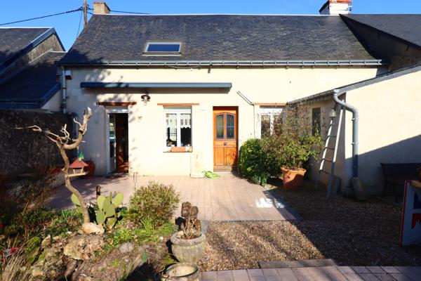 Maison de bourg, charme, caractère et jardin intimiste.