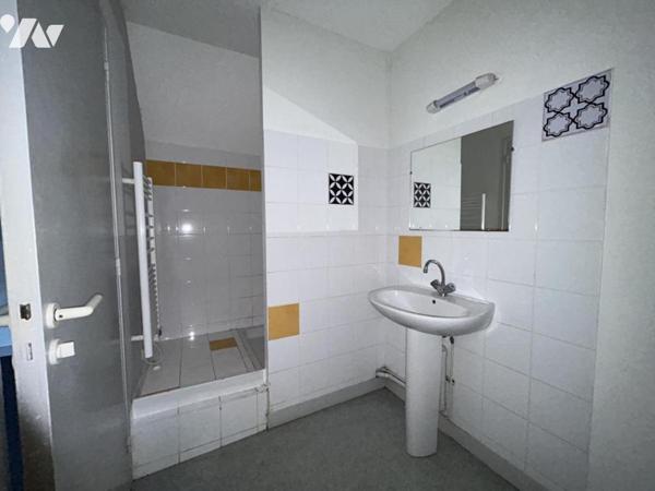 immeuble mixte professionnel et appartement à vendre à guer 56 morbihan