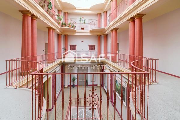 Appartement de 60m2 avec 1 chambre, garage et cave privée.