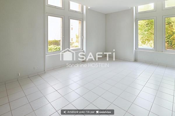Appartement de 60m2 avec 1 chambre, garage et cave privée.