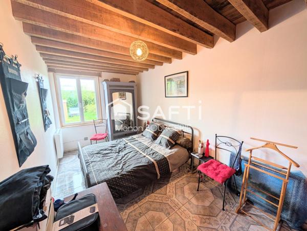 Longère en pierres et briques de 122 m2 à proximité du bourg de Planches et de Ste-Gauburge-Sainte-Colombe : charme authentique et quiétude normande