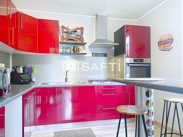 Maison individuelle d'environ 90 m2 avec un atelier