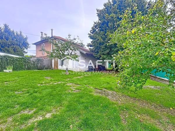 Maison individuelle d'environ 90 m2 avec un atelier