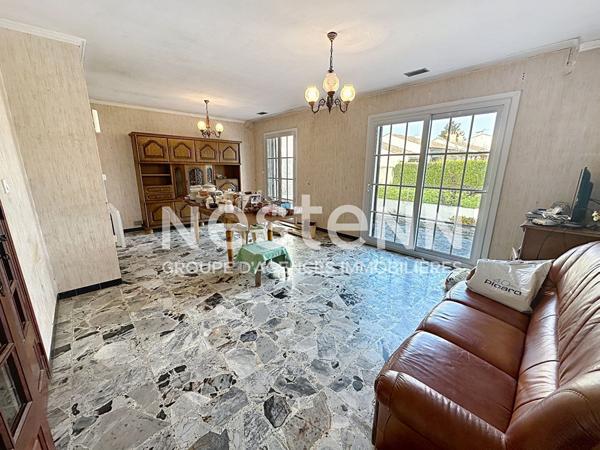 Maison de plain-pied avec véranda, garage et terrain de plus de 500 m² Saint-Martin-de-Crau centre