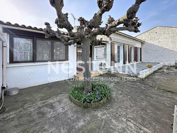 Maison de plain-pied avec véranda, garage et terrain de plus de 500 m² Saint-Martin-de-Crau centre