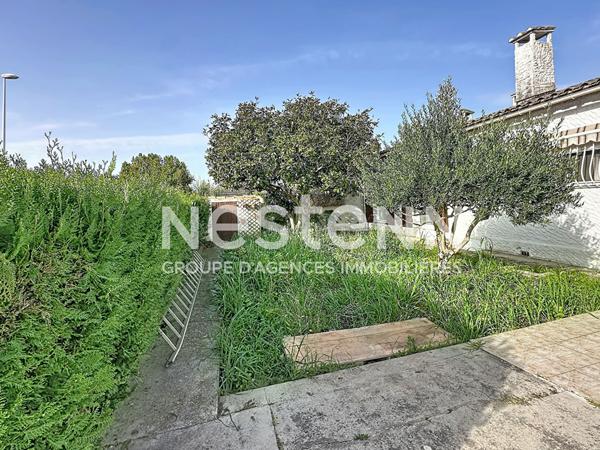 Maison de plain-pied avec véranda, garage et terrain de plus de 500 m² Saint-Martin-de-Crau centre