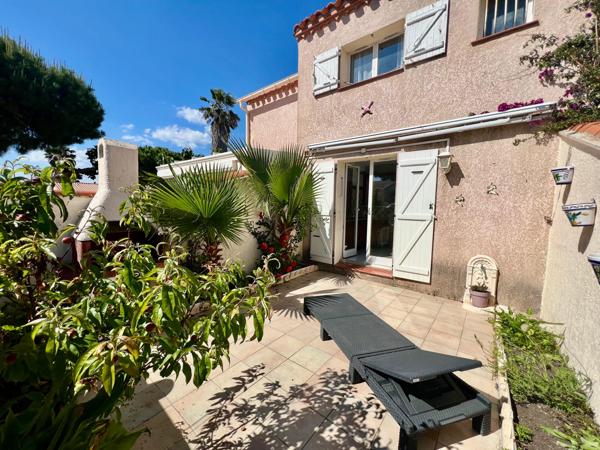 Maison à la plage (jardin et garage)