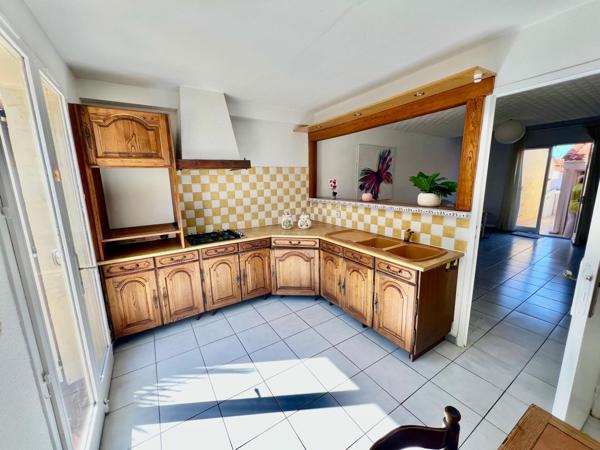 Maison à la plage (jardin et garage)