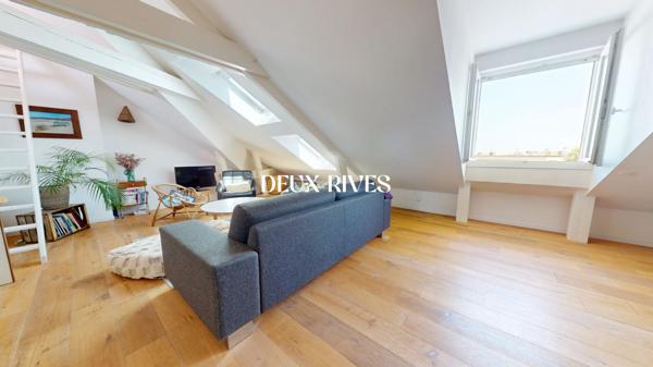 NANTES CENTRE Appartement Loft, coup de coeur de 103 m² au sol, garage, dernier étage