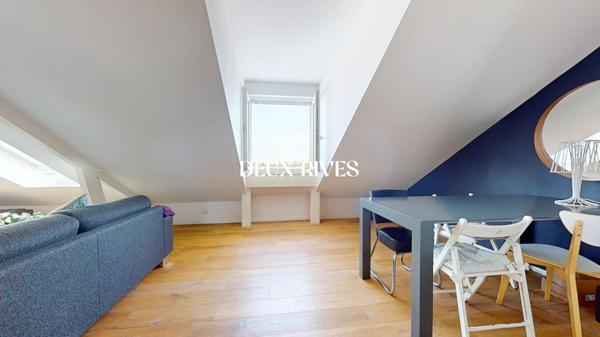 NANTES CENTRE Appartement Loft, coup de coeur de 103 m² au sol, garage, dernier étage