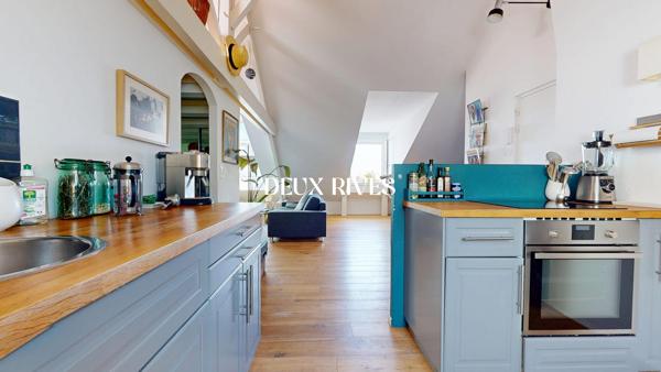 NANTES CENTRE Appartement Loft, coup de coeur de 103 m² au sol, garage, dernier étage