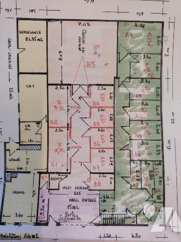 immeuble comprenant une maison d'habitation louée et box de stockage
