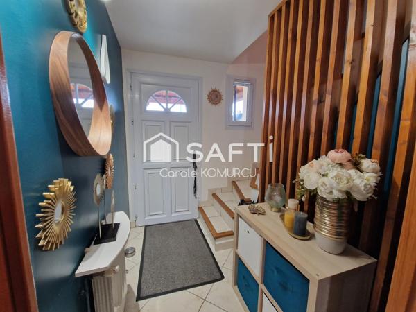 Maison familiale de 2002 à Neuville Sur Oise.