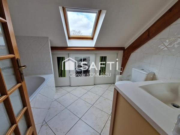 Maison familiale de 2002 à Neuville Sur Oise.