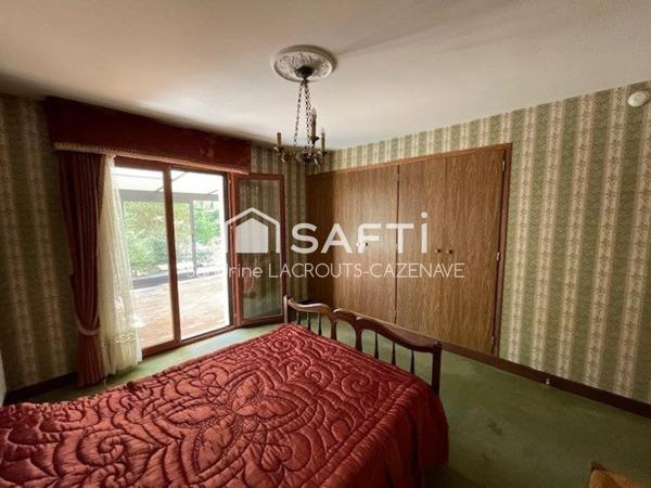 LIMERE - MAISON SUR SOUS-SOL COMPLET - VERANDA ET TERRAIN CLOS DE 2500 M2