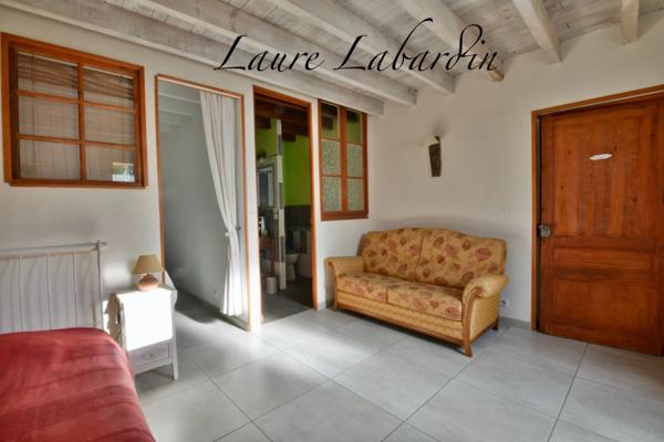 Propriété - une maison d'habitation - 5 chambres d'hôtes - 2 appartements en location sur plus de 1 hectare à SAINTE BAZEILLE (47)