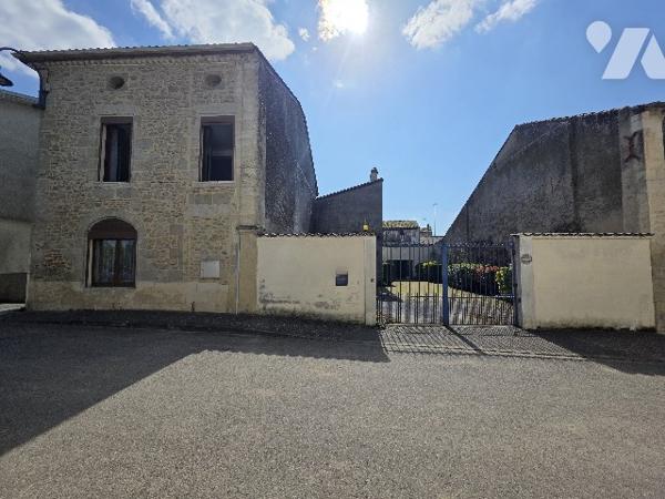 Maison de village 180 m² avec grand garage et beaux volumes – Proche Marmande
